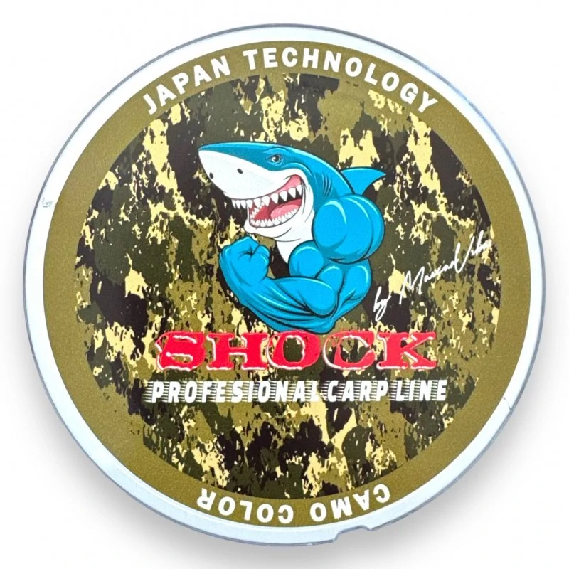 Šokový Vlasec Shock Mussel Leader Camo 0,50mm 100m